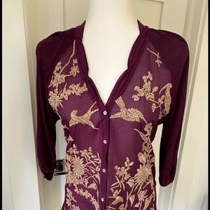 Tiny women’s embroidered blouse.